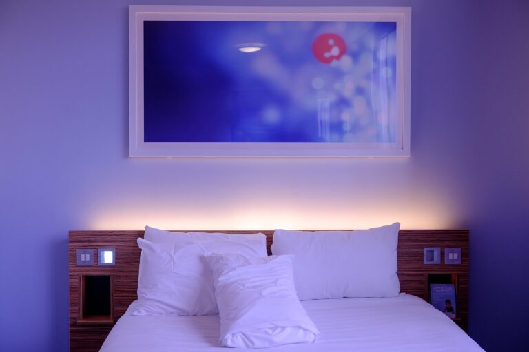 bedroom hotel room bed bed sheets 1285156